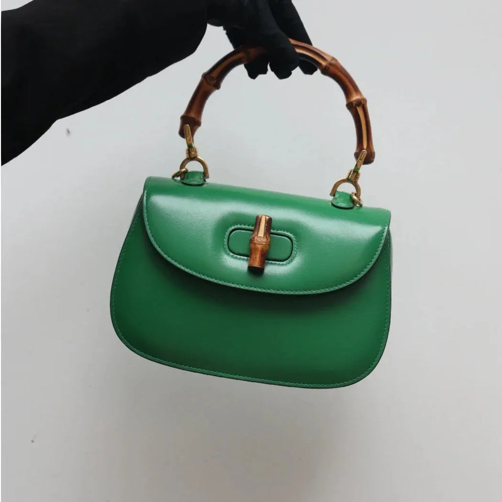 Genuine leather bamboo handle saddle bag 2025 niche design cowhide high-end single-shoulder cross-span bag fashion women haadbag