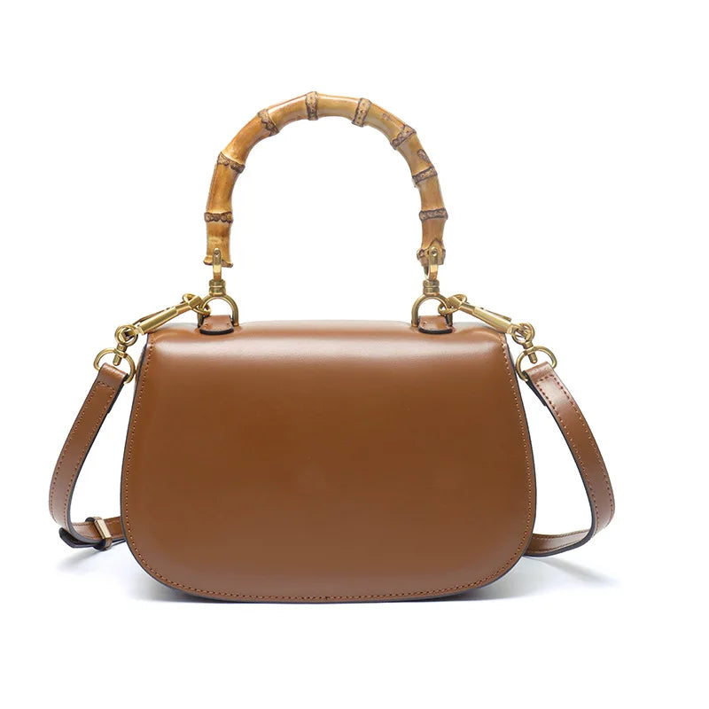 Genuine leather bamboo handle saddle bag 2025 niche design cowhide high-end single-shoulder cross-span bag fashion women haadbag