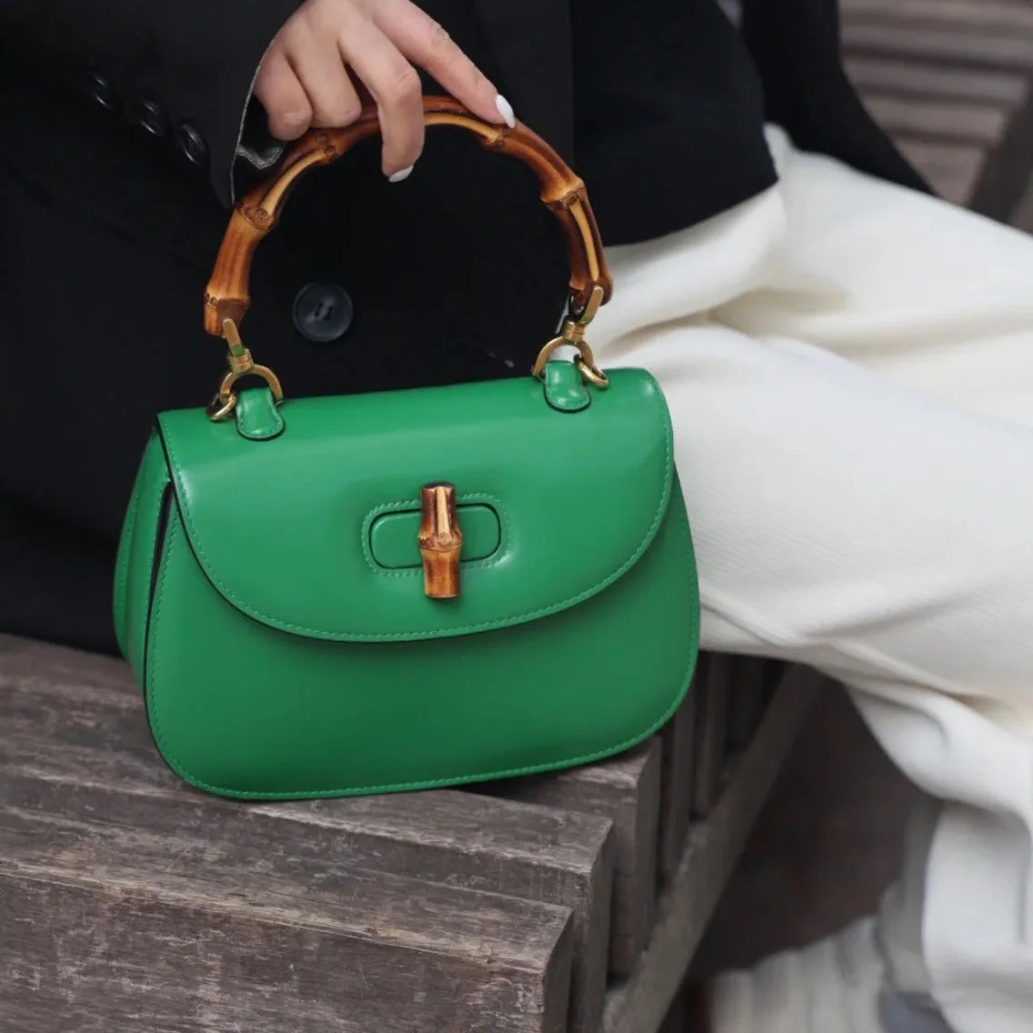 Genuine leather bamboo handle saddle bag 2025 niche design cowhide high-end single-shoulder cross-span bag fashion women haadbag