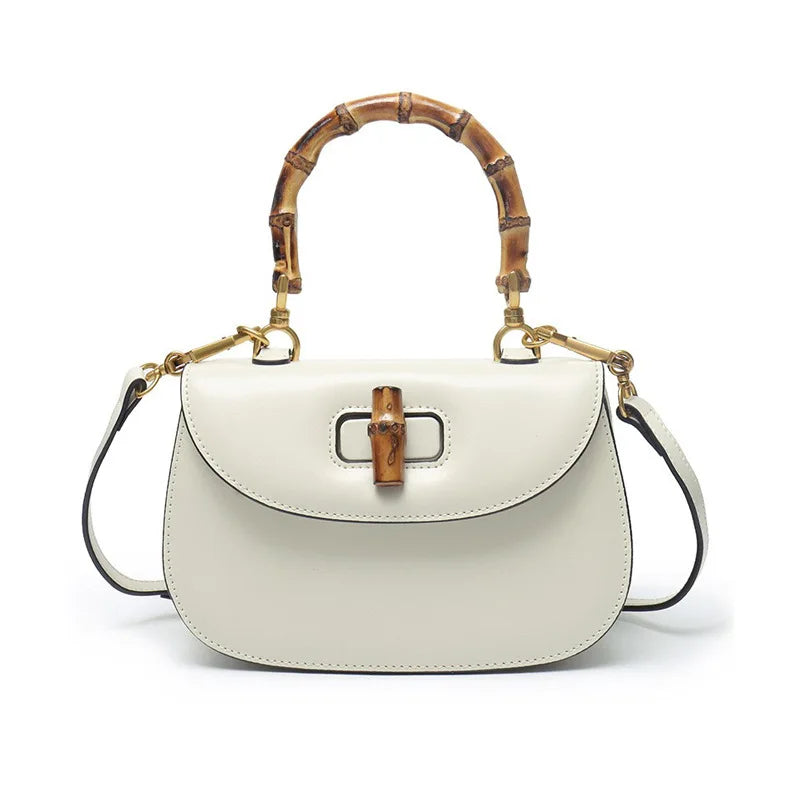 Genuine leather bamboo handle saddle bag 2025 niche design cowhide high-end single-shoulder cross-span bag fashion women haadbag