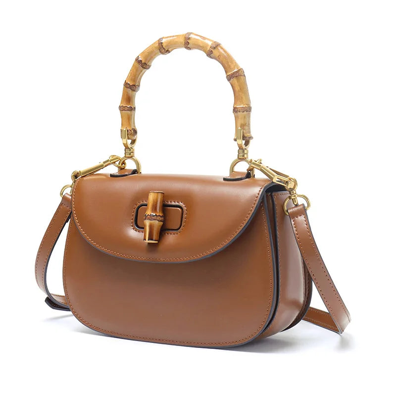 Genuine leather bamboo handle saddle bag 2025 niche design cowhide high-end single-shoulder cross-span bag fashion women haadbag