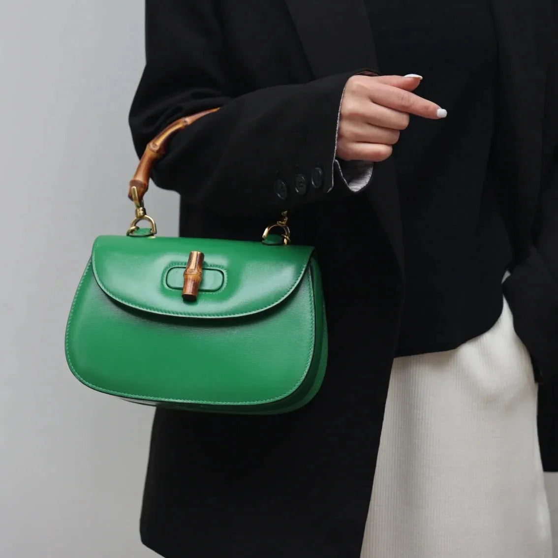 Genuine leather bamboo handle saddle bag 2025 niche design cowhide high-end single-shoulder cross-span bag fashion women haadbag